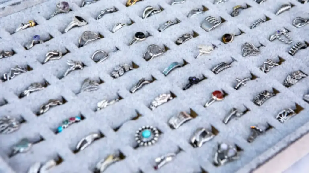 many silver rings in a box